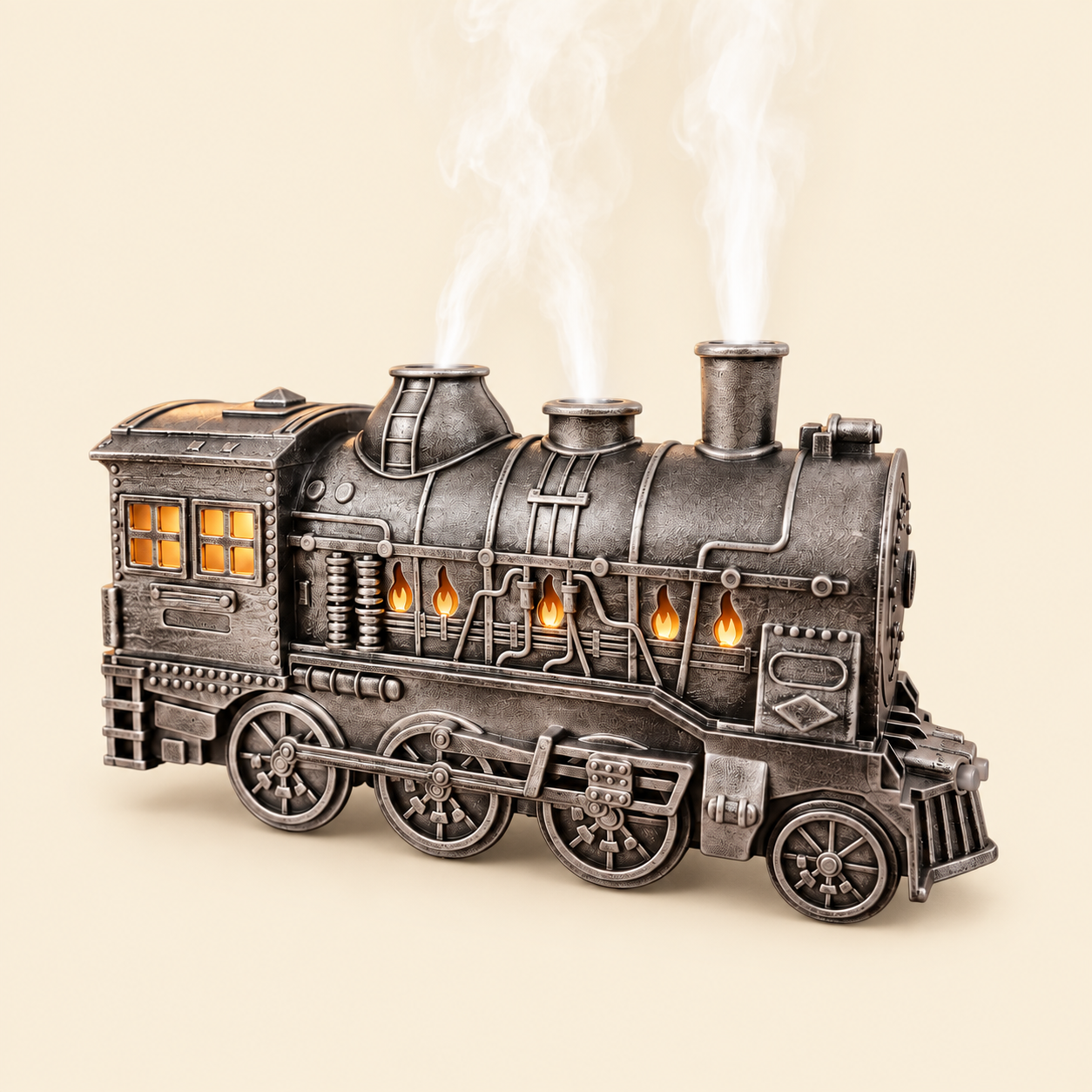 Silver vintage steam train aroma diffuser and essential oil humidifier with remote control, glowing cabin windows and rising steam mist